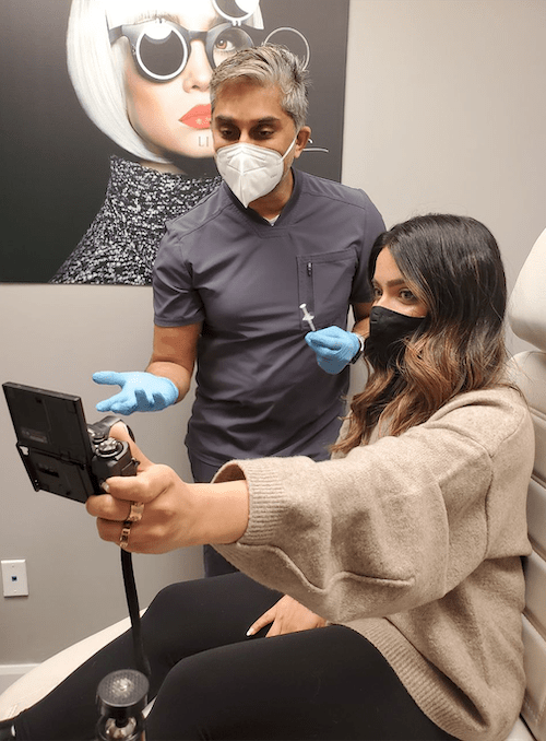 Dr. Bector with Patient - Aesthetic Training Centre